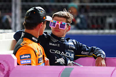 Max Verstappen and Lando Norris in a Lego pink Cadillac in parc ferme during the F1 Grand Prix of Las Vegas at Las Vegas Strip Circuit on November 22, 2025 in Las Vegas, Nevada.