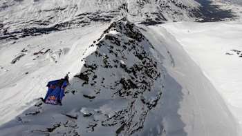 The Red Bull Skydive Team take flight over Obergurgl, Austria.