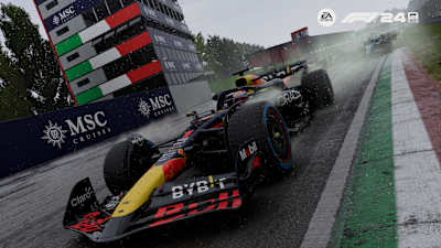Screenshot from F1 24 shows a race in Imola in the rain with Max Verstappen's car.