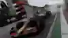 Screenshot from F1 24 shows a race in Imola in the rain with Max Verstappen's car.