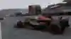 Screenshot from F1 24 shows Daniel Ricciardo and Sergio Pérez in a duel at Spa.