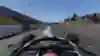 Screenshot from F1 24 shows the Red Bull RB 20 in turn 1 of the Red Bull Ring.