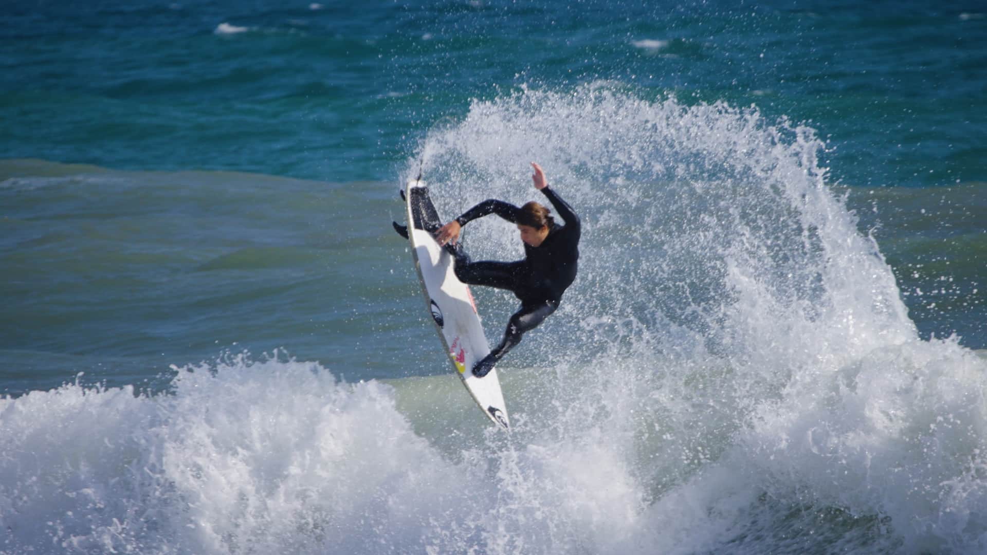Leo Fioravanti does an aerial, surfing in Italy.