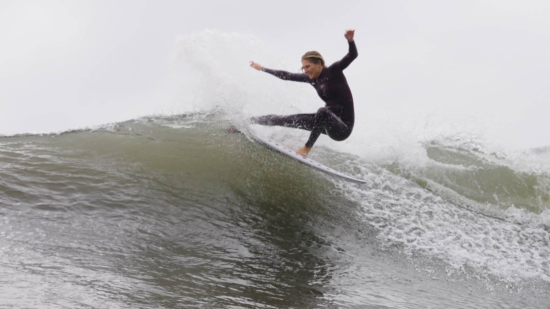 Steph Gilmore surfing in Sardinia, Italy.