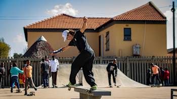 Brandon Valjalo Backside Tailslides a bench at the Pimville DIY skatepark in Soweto, South Africa.