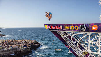 Maria Paula Quintero dives from the 21.5m platform during the final competition day of the third stop of the Red Bull Cliff Diving World Series in Polignano a Mare, Italy on July 2, 2023.