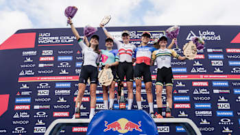 Red Bull-sponsored athletes celebrate victory at the UCI Cross-Country Mountain Bike World Cup 2024 event in Lake Placid, USA