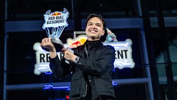 Soj Gamayon of the Philippines smiles upon receiving the winner's trophy for his AgriConnect idea at the Red Bull Basement World Final in Tokyo, Japan in December 2024.