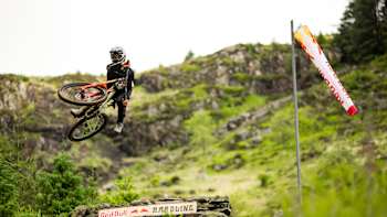 Edgar Briole riding the Dirty Ferns section at Red Bull Hardline 2024 Dinas Mawddwy, United Kingdom.