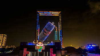 Dazzling drone display forms a Red Bull can above the Red Bull Tetris World Final stage in Dubai, UAE, on 13 December 2025, blending classic gaming energy with spectacular visuals.