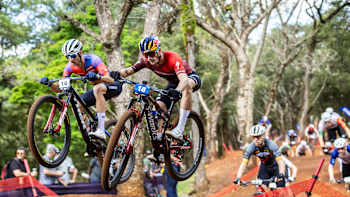 Martin Vidaurre competes at the UCI XCC World Cup in Araxá, Brazil, on April 11, 2025, showcasing exceptional mountain biking skills among world-class competitors
