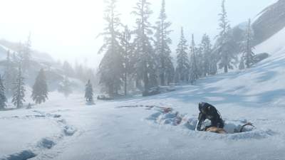 Screenshot of hunting in snow in Red Dead Redemption 2.