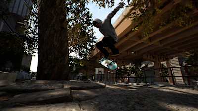 Screenshot of a character jumping in Session, the skateboarding video game by creā-ture Studios.