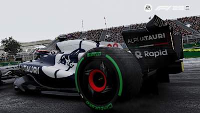 La captura de pantalla de F1 23 muestra el AlphaTauri de Yuki Tsunoda en Canadá bajo la lluvia.
