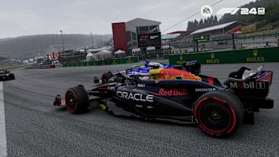 Screenshot from F1 24 shows Daniel Ricciardo and Sergio Pérez in a duel at Spa.