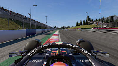 Screenshot from F1 24 shows the Red Bull RB 20 in turn 1 of the Red Bull Ring.