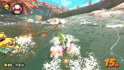 Une course avec Yoshi sur l'eau dans le jeu Mario Kart World.