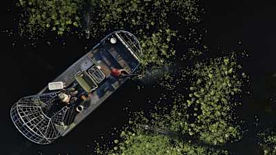A screenshot from GTA 6 shows a hovercraft in the Grassrivers region.