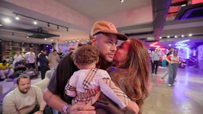 Neymar Jr celebrates with his wife, Bruna Biancardi, and daughter after being named in Brazil’s squad for the 2026 World Cup at his home in Santos, Brazil on May 17, 2026.