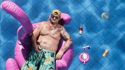 Cal Hampton floats in a pool in Grand Theft Auto VI / GTA 6.