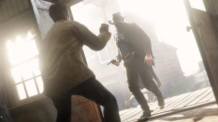 Arthur Morgan threatens a townsperson in Red Dead Redemption 2, the new game by Rockstar Games.