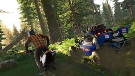 A screenshot of a dirt bike and Proto Buggy in action from The Crew 2 