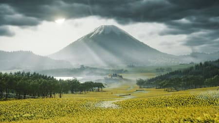 Las ilustraciones de Ghost of Yotei muestran el volcán Monte Yotei al fondo con un prado de flores en flor.