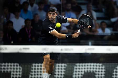 Alejandro Galán of Spain strikes the ball during the 2026 London Premier Padel P1 final at Olympia London, Great Britain, on 9 August 2026.