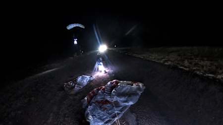 Red Bull Air Force skydivers land in the dark in Marfa.