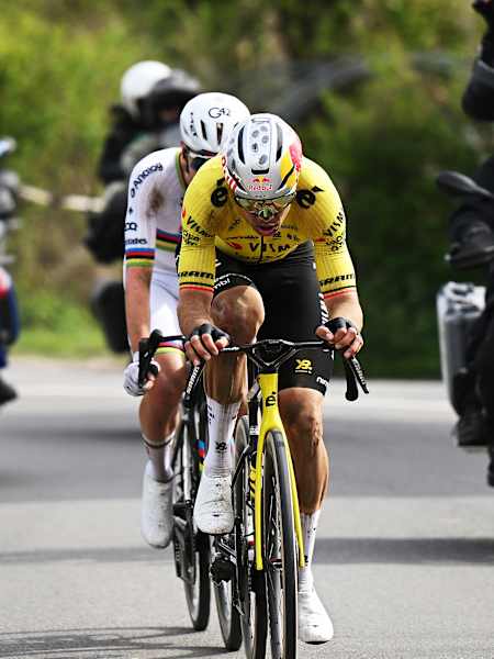 Tadej Pogacar and Wout van Aert riding together during the Men's Elite race on April 12, 2026 in Roubaix, France.