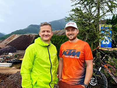 Two fans are pictured at the Red Bull Erzbergrodeo. 
