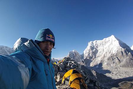 David Lama takes a selfie while attempting a mountain summit.