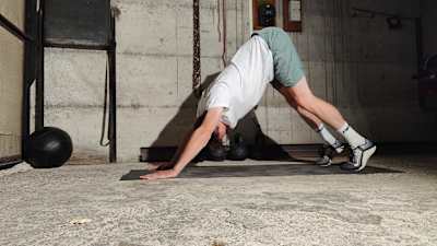 The downward dog is a total body posterior stretch – you should feel a big stretch across the hamstrings, calf muscles, upper back and the outside of the shoulders