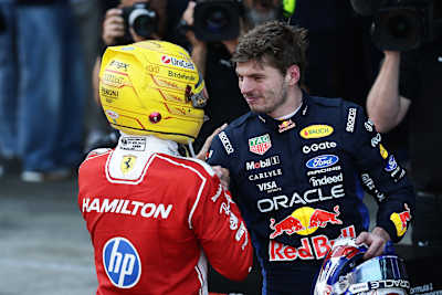 Race winner Lewis Hamilton is congratulated by Max Verstappen in parc ferme during the F1 Grand Prix of Barcelona-Catalunya at Circuit de Barcelona-Catalunya.
