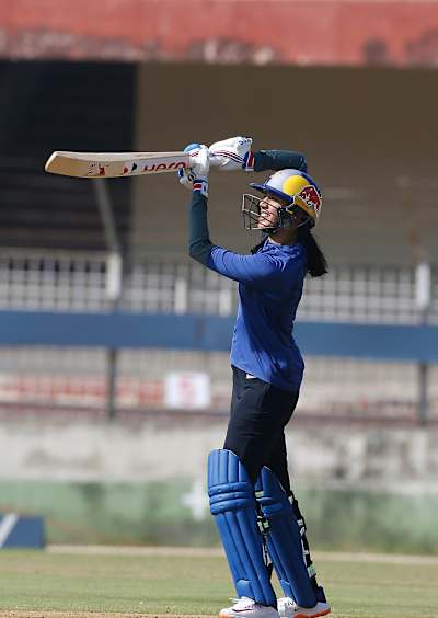 Indian women's cricket team opening batter Smriti Mandhana plays a shot.