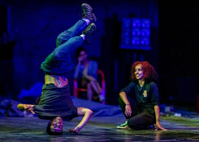 B-Boy Sunni and B-Girl Sarah Bee rehearse before before a shoot.