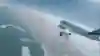 Jetmen Yves Rossy and Vince Reffet fly next to an Airbus 