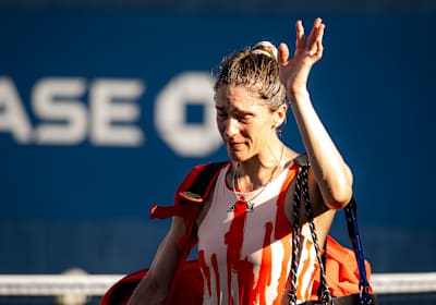 Tennis player Andrea Petković pictured leaving the court during her final ever match at the 2022 US Open.