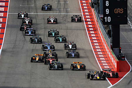 Max Verstappen and Charles Leclerc of Monaco battle for position into turn one at the F1 Grand Prix of United States at Circuit of The Americas on October 21, 2023 in Austin, Texas. 