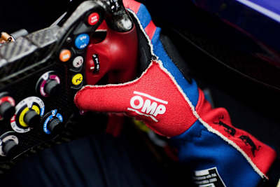A close-up photo of Daniel Ricciardo's button adorned steering wheel during the 2012 FIA Formula One World Championship.