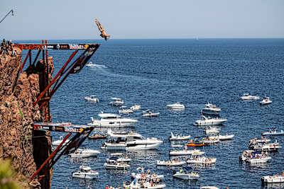 Catalin Preda of Romania dives from the 27m platform during the final competition day of the first stop of the Red Bull Cliff Diving World Series in Saint Raphael, France on June 12, 2021.
