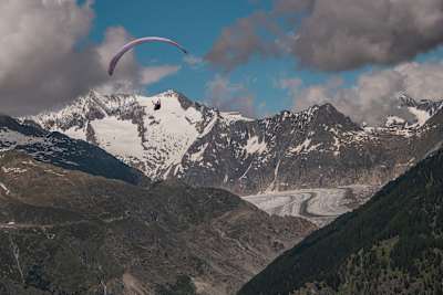 Paul Guschlbauer performs during the Red Bull X-Alps above Fiesch, Bettmeralp, Switzerland on June 25, 2021.