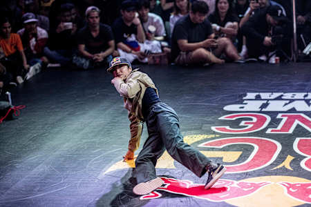 An action shot of B-Girl Ami doing footwork in Mumbai.