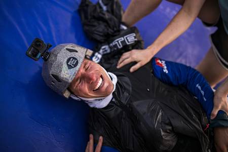 Lars Meerstetter (SUI4) beams with triumph at the Red Bull X-Alps 2025 in Zell am See, Austria.