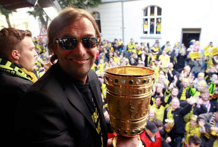 Jürgen Klopp celebrates with the DFB-Pokal in Dortmund.