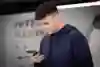 Isack Hadjar working on his social media during the Macau GP 2023