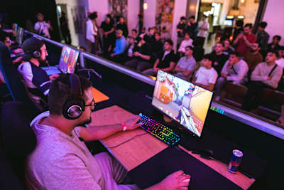 Participants gaming during the Red Bull Home Ground National Final at Vilvoorde, Belgium May 27, 2024. 