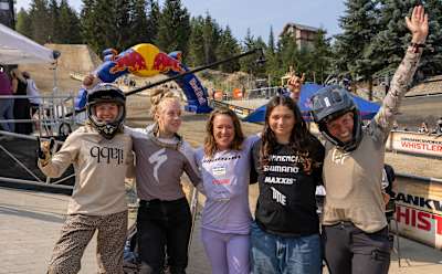 In 2024, riders Alma Wiggberg, Natasha Miller, and Kathi Kuypers pose cheerfully at Red Bull Joyride in Whistler, Canada