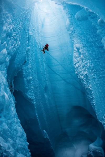Will Gadd lowers into a moulin during his trip to explore the Greenland ice cap in 2018.