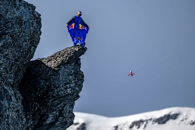 Peter Salzmann stands on the ledge about to jump.